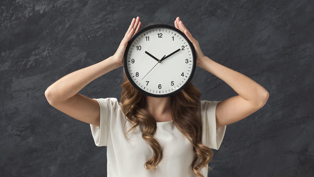 Woman Holding Clock Instead Of Head