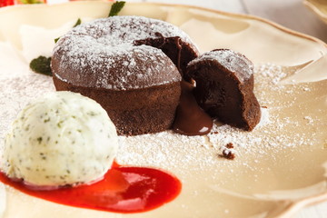 Chocolate fondant with vanilla ice cream and strawberry