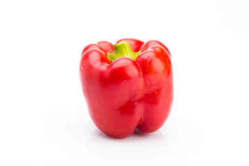 Front view of red pepper on a white background, vegetable to flavor