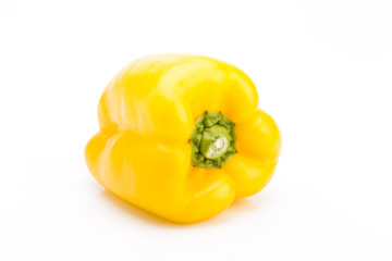 Front view of yellow pepper on a white background, vegetable to flavor
