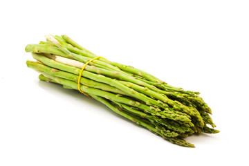 Fresh green asparagus isolated on white background