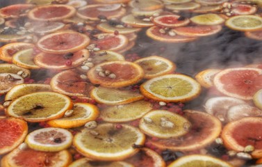 Obraz na płótnie Canvas Mix of citrus in a hot drink 
