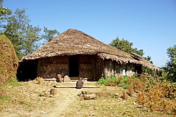 Plakat Wodden long house in Longwa tribal village, Mon, Nagaland, India, Myanmar
