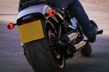 Naklejka premium The biker rides a motorcycle