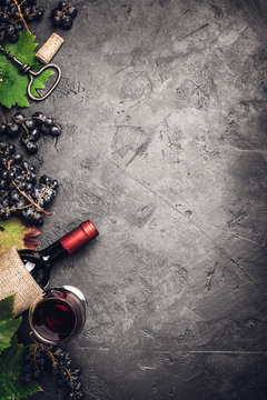 Wine composition on dark rustic background