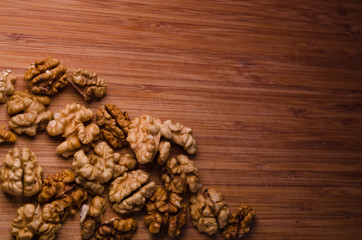 Walnuts Seeds on Wooden Background