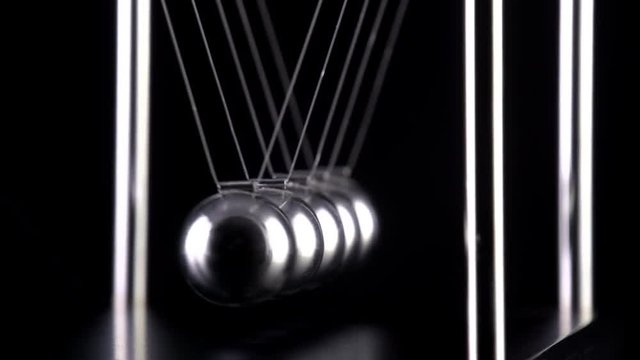 Newton's Cradle in slow motion.