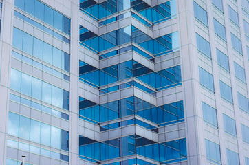 pattern of window building wall background. texture of modern window building architecture construction from skyscraper.