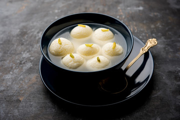 Indian Rasgulla or Rosogulla dessert/sweet served in a bowl. selective focus