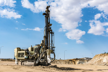 Drilling rock in the works of creating a road