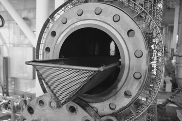 Open cover suction strainer of heating medium circulation pump on oil and gas process offshore...