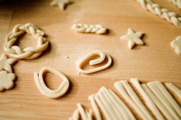 Ingredients for cooking apple pie. Fresh harvest apples, cinnamon, flour, sugar and baking mold over  rustic wooden background. 
