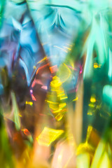 Abstract defocused multicolored background with glass glare.