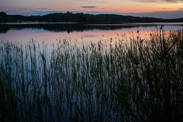 sunset over the lake in sweden