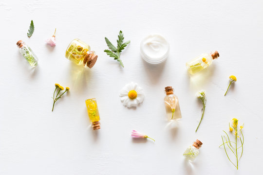 natural cosmetics for the face and body care with herbal ingredients on a white background