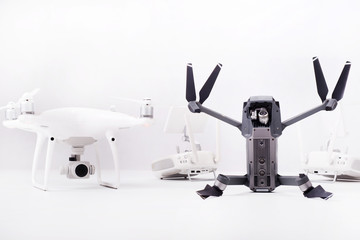 Flying drones with video camera on a white background.