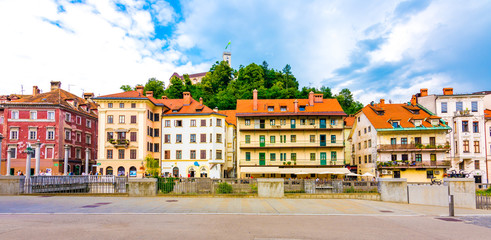 Plakat Ljubljana city street panorama view. Old buildings and historic architecture. The old castle on the hill in the city. Ljubljana is the Slovenia capita