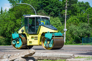Light Vibration roller compactor at road construction and repairing asphalt, pavement works
