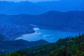 Obraz premium Begnas Tal, Nepal with the Annapurna Himalaya visible in the background at sunset
