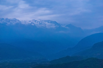 Begnas Tal, Nepal with the Annapurna Himalaya visible in the background at sunset