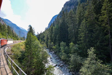 Fototapeta na wymiar On a train to Zermatt through the Swiss alps