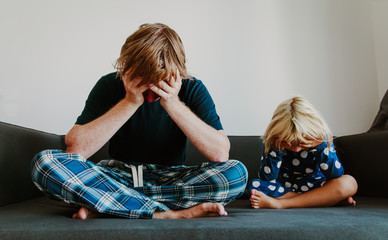 stresses sad little girl with father, family in problem