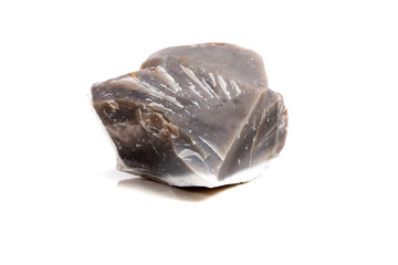 Macro mineral stone Flint in the rock on a white background