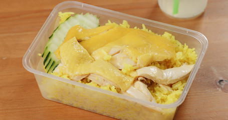 Hainanese chicken rice in take away box
