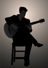 Naklejka premium Silhouette of Spanish guitarist playing flamenco sitting on a chair
