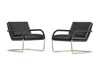 Obraz premium Two black leather chairs on a metal base on a white background 3d rendering