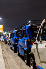 Naklejka premium mini taix queueing for passenger
