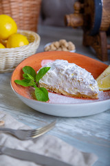 Close up view of beautiful elegant sweet dessert served on the plate. Beautiful decoration, restaurant dish, ready to eat. Tea time, cozy atmosphere.