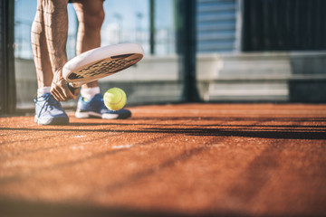 Sportsman playing padel game