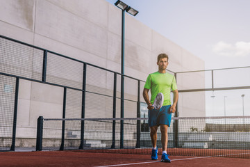 Sportsman playing padel game