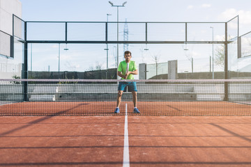 Obraz premium Sportsman playing padel game