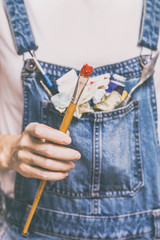 girl painter holds a brush