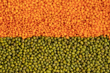 Orange and green lentils full background, top view