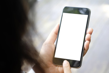 Mockup smartphone on female hands empty display.
