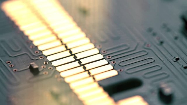 Shiny contacts of computer circuit board, macro shot