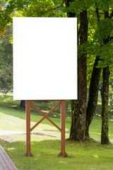 Mock up. Outdoor advertising, blank billboard outdoors, public information board in the park