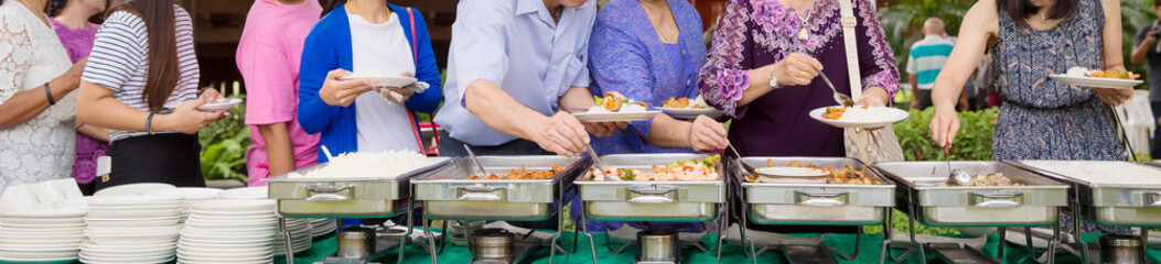 Food Buffet Catering Dining Eating Party Sharing Concept.people group catering buffet food indoor in luxury restaurant with meat colorful fruits and vegetables