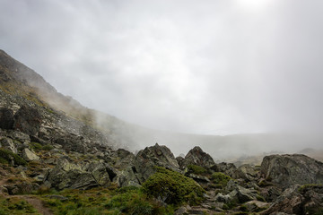 Fog rolling in at lake Stellisee with a view of the Matterhorn
