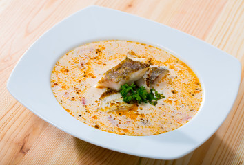Codfish soup with vegetables