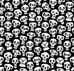 Cartoon skulls seamless pattern. White skulls isolated on black background. Vector illustration.
