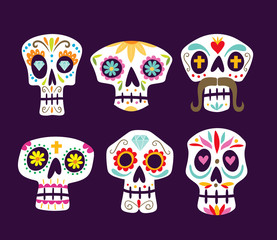 Colorful mexican skull collection. Cute cartoon sugar skulls isolated on purple background. Set 1 of 2. Vector illustration.