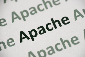 word Apache language printed on paper macro