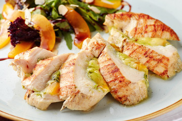 Stuffed chicken breast with salad