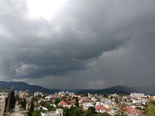 Fototapeta na wymiar Heavy storm clouds and strong wind over the town. Slovakia