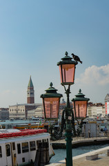 Fototapeta premium View of piazza san marco and grand canal behind a typical venetian light pole, Venice, Veneto, Italy