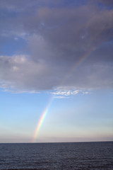 rainbow over the sea,horizon,nature,sky,weather,cloud,blue,light,color